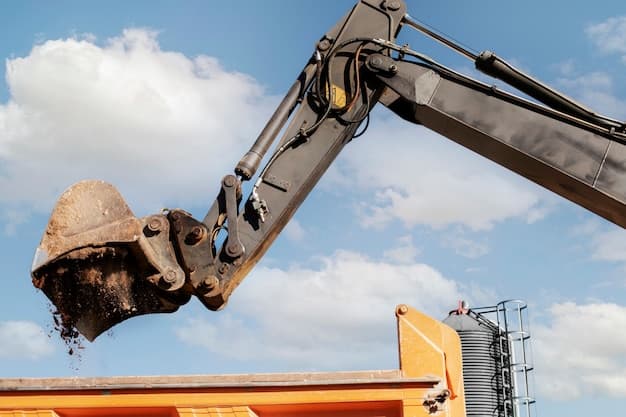 Heavy machinery working ground to deepen a borehole